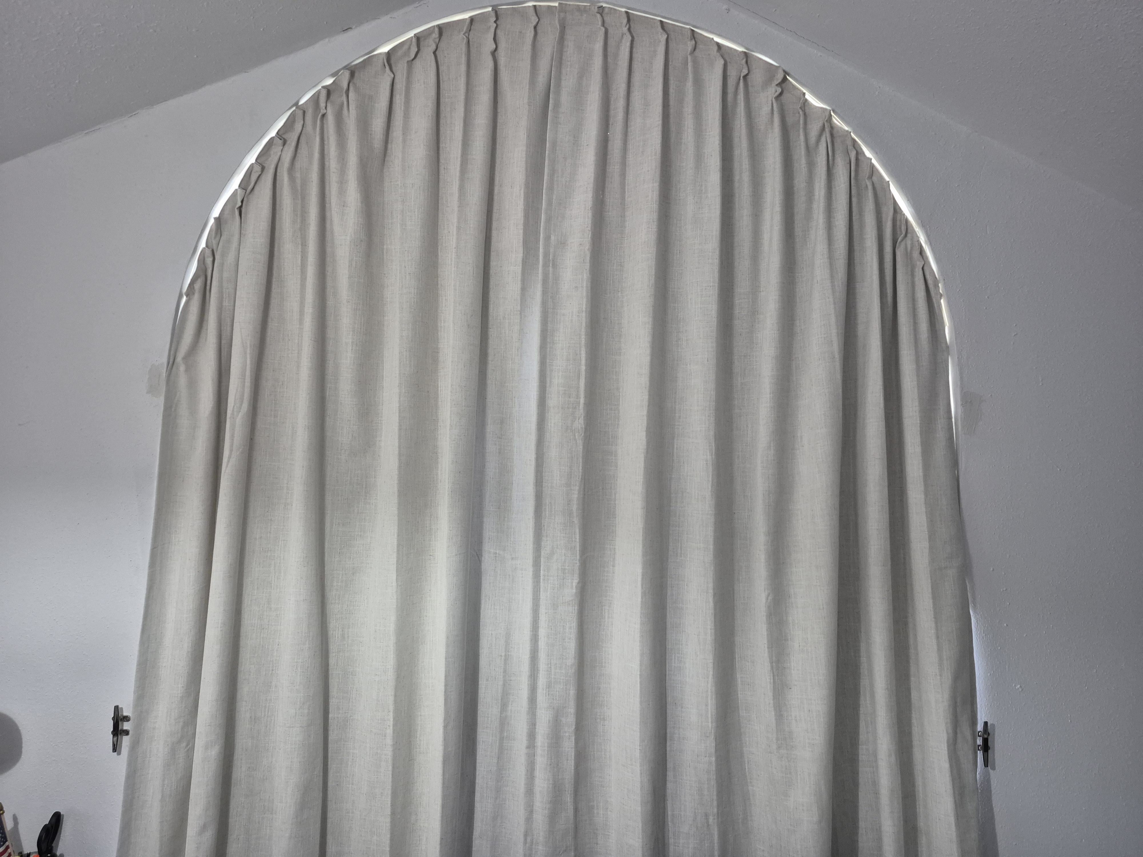 Curved curtain rod installation